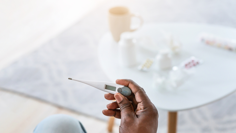 Older adult speaking with a healthcare provider about RSV risk and prevention